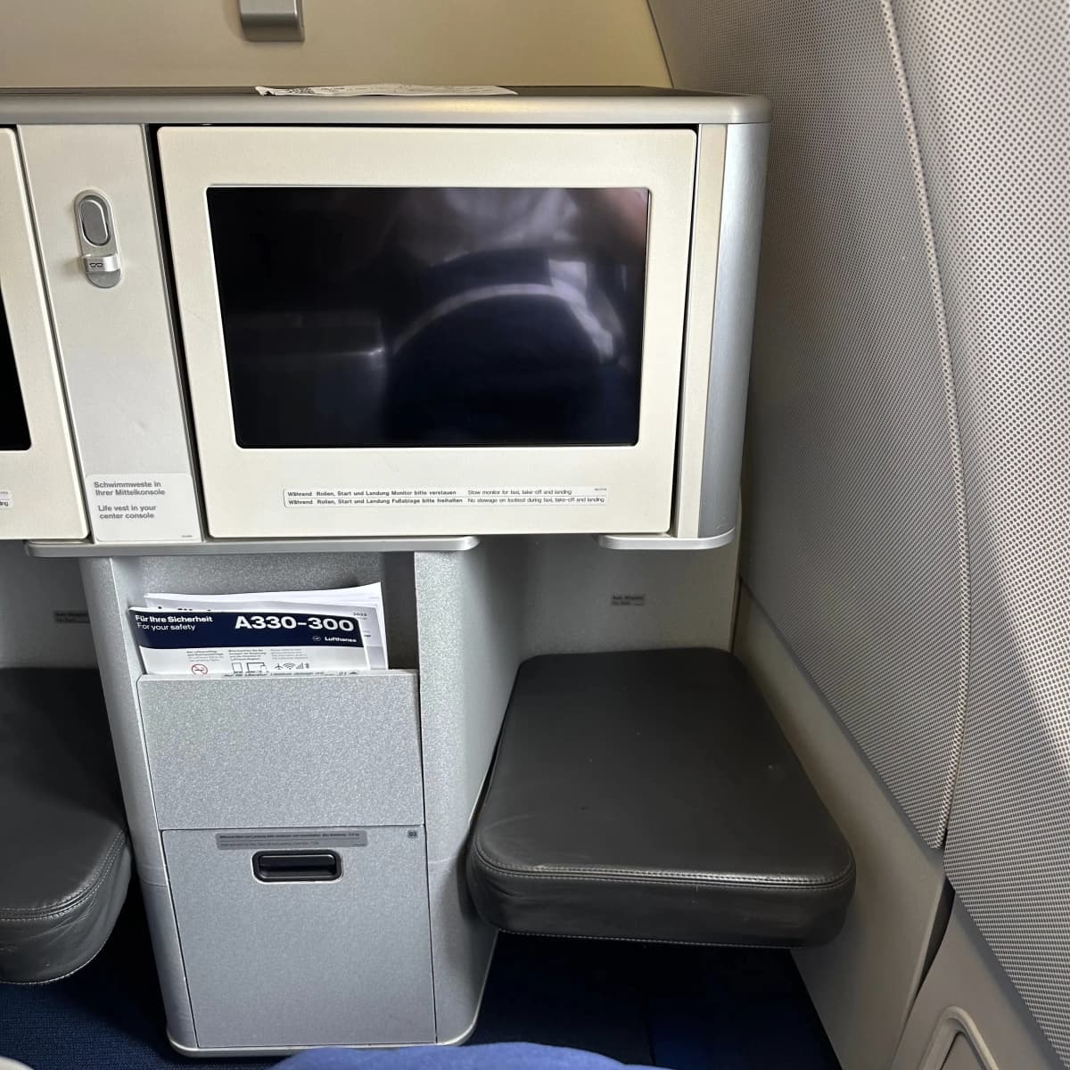 Lufthansa Airlines business class TV and footwell.