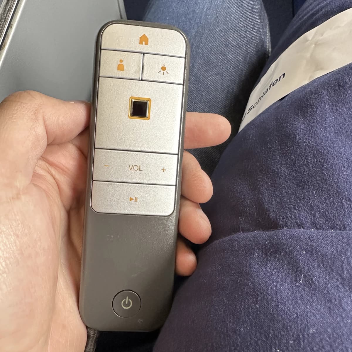 Lufthansa Airlines business class uses a TV remote with trackpad.