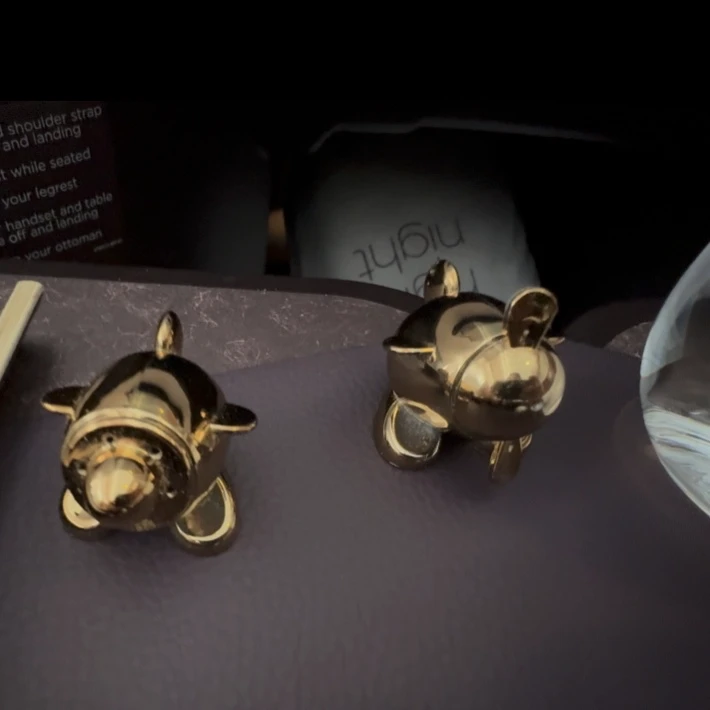 Virgin Atlantic Upper Class salt and pepper shakers with unique airplane-themed design.