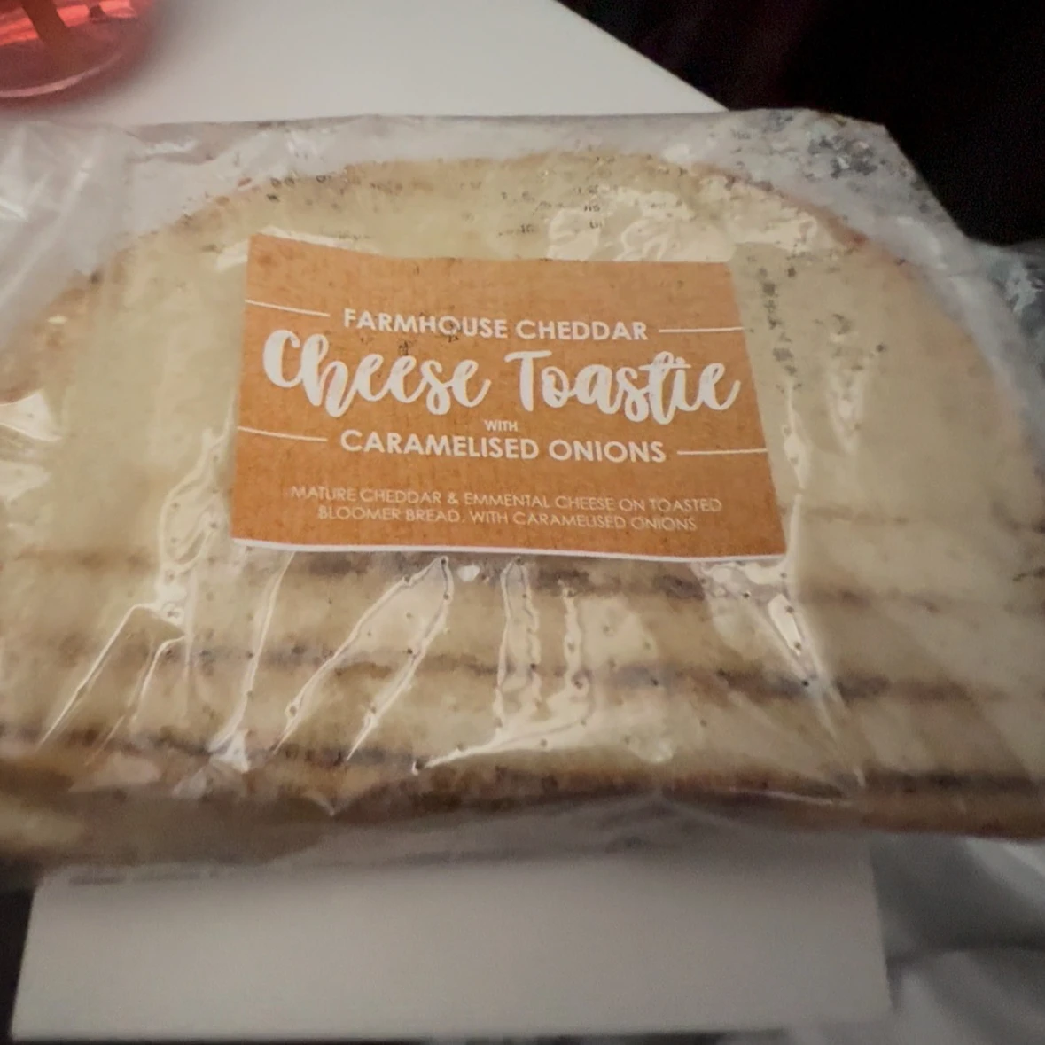 Grilled cheese toastie with caramelized onions served mid-flight in Virgin Atlantic Upper Class.