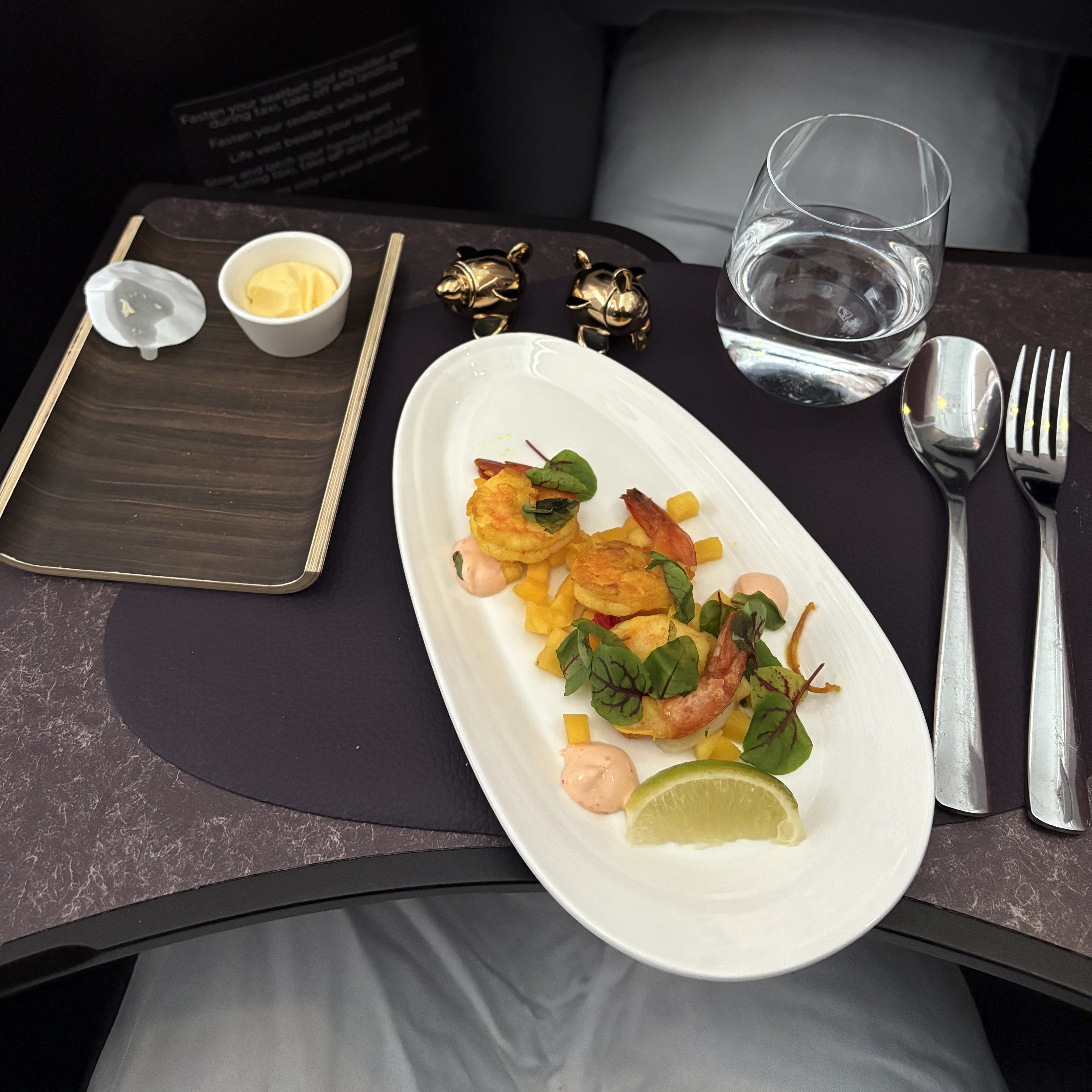 Shrimp appetizer served in Virgin Atlantic Upper Class with elegant plating.
