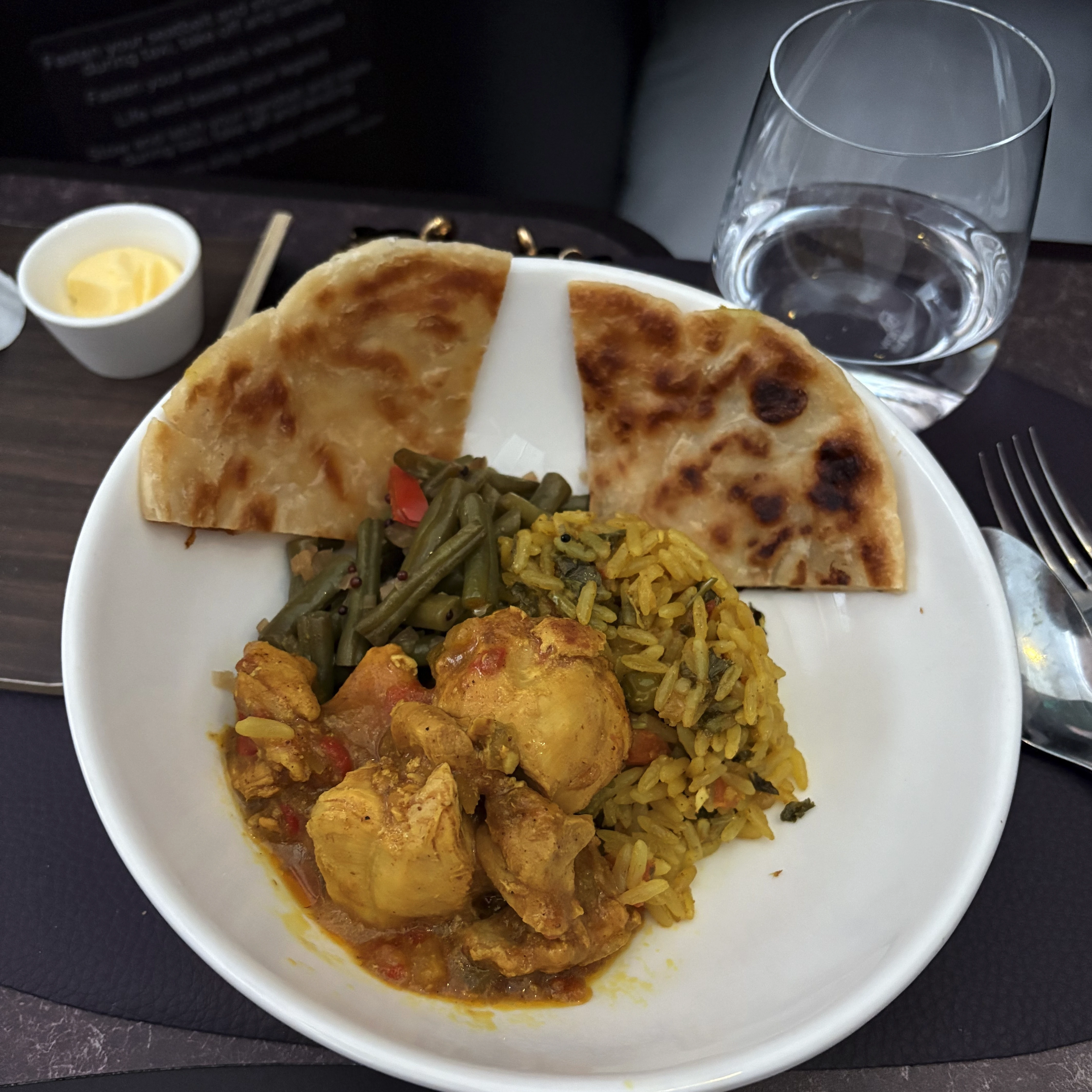 Virgin Atlantic Upper Class chicken karahi with paratha served as the main course.