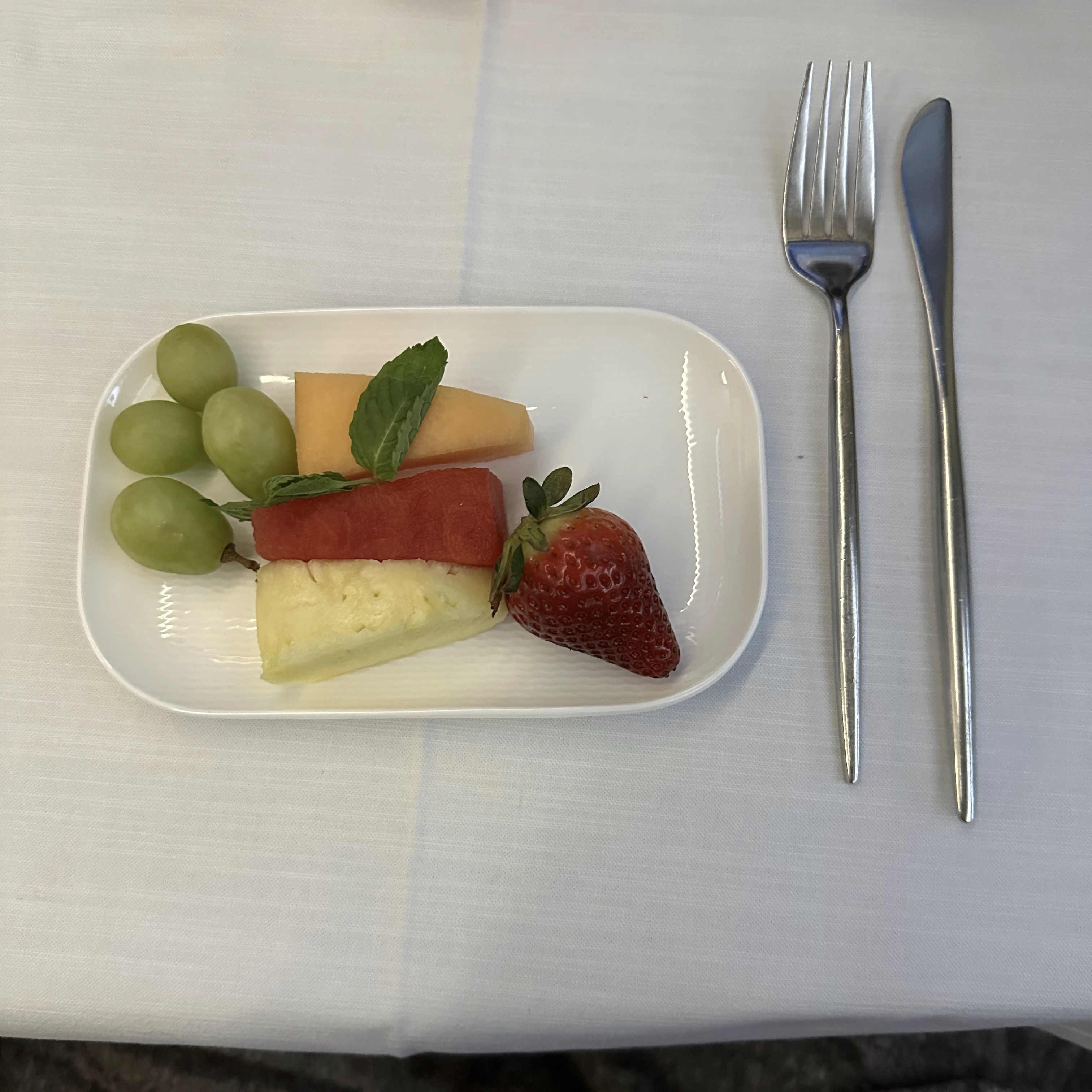 Starlux Airlines A350 business class breakfast fruit platter.