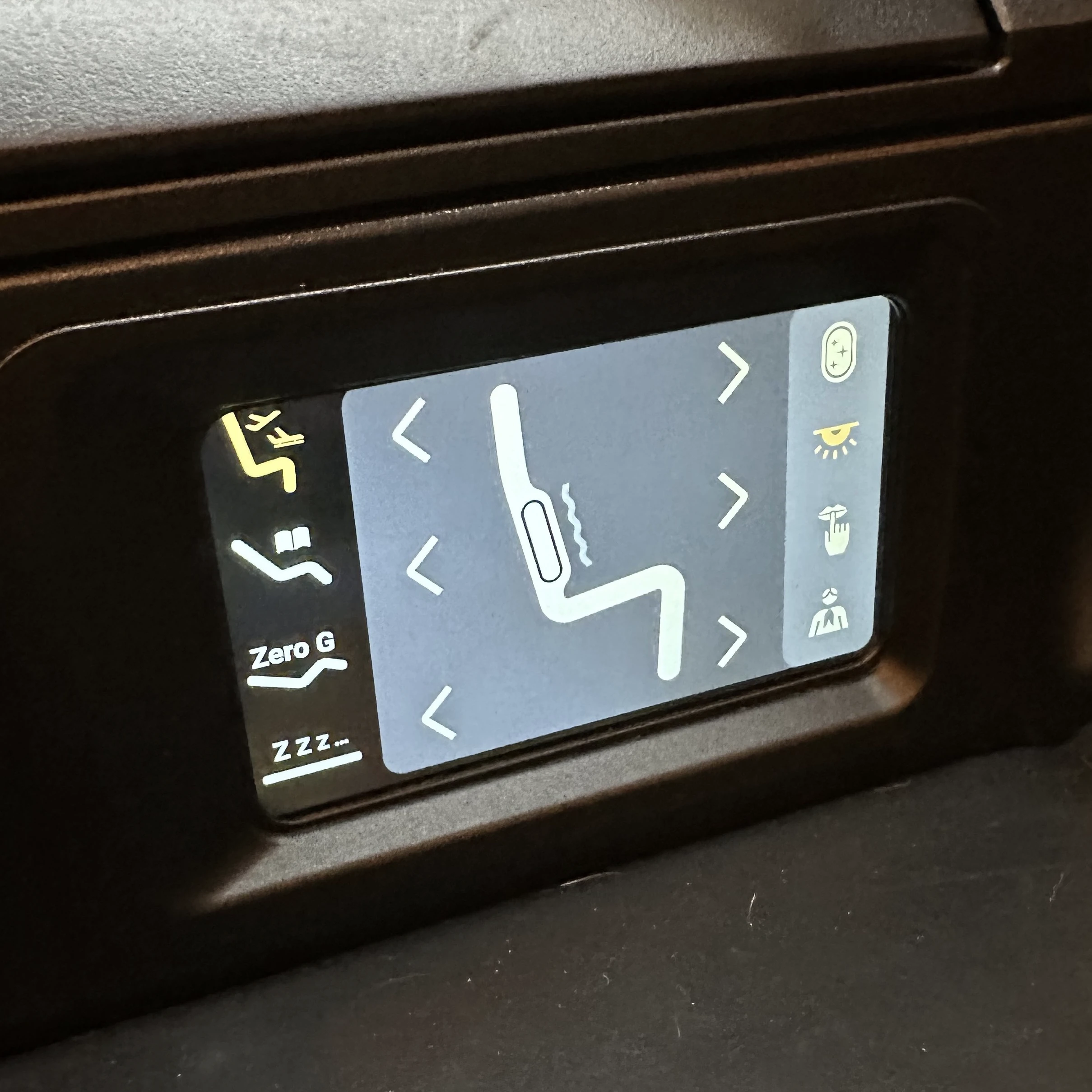Starlux Airlines A350 business class touch-screen seat control.